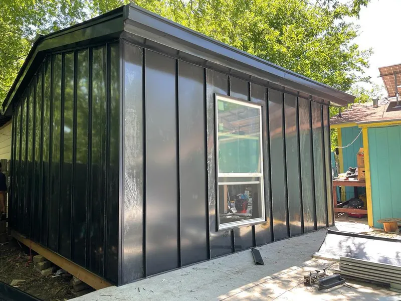 Black standing seam metal wall panels for Metal Roof Installation in Oklahoma City