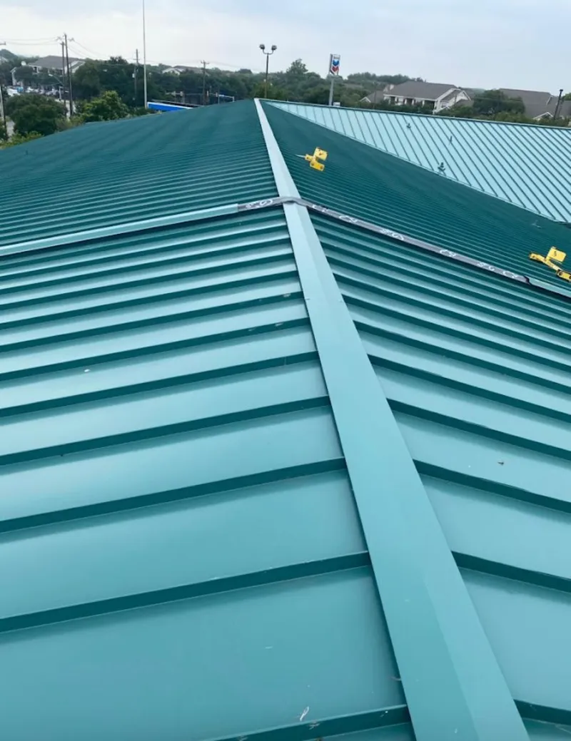 Green commercial metal roof ridge and valley for Metal Roof Repair in Oklahoma City