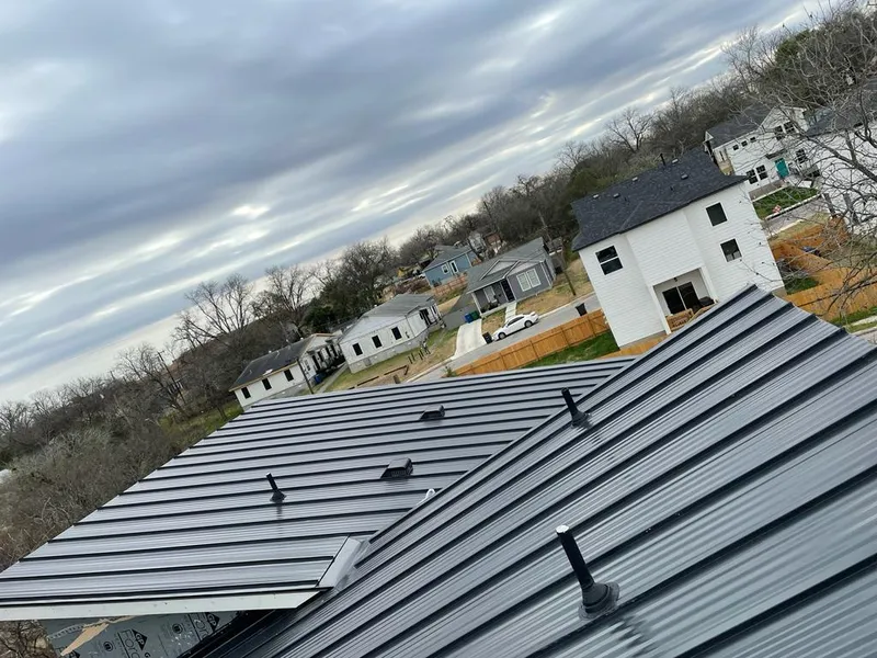 Standing seam metal roof panels with vents for Skylight Repair in Oklahoma City
